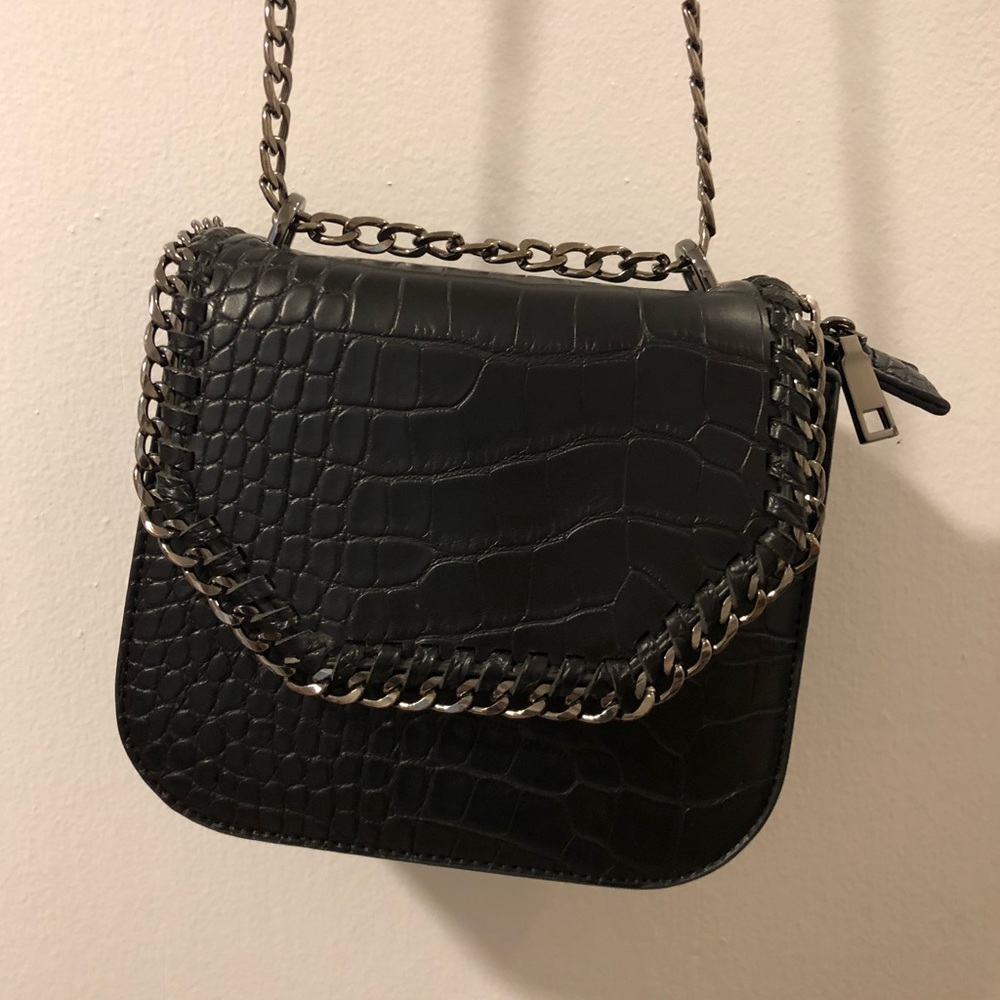 Black vegan snake skin bag
